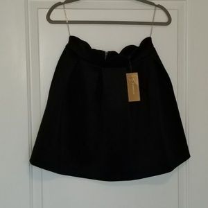 Scalloped high waisted black mini skirt